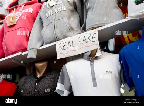 how to spot fake designer clothing|counterfeit designer clothing.